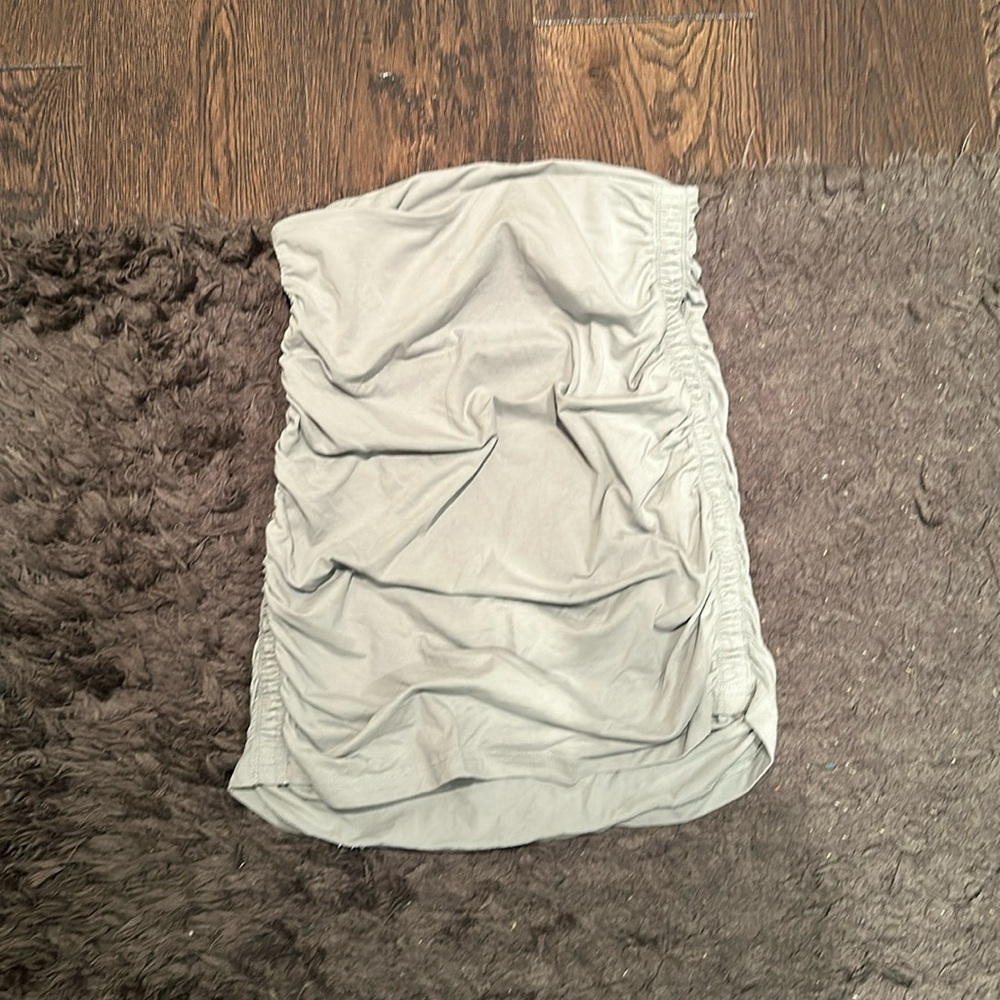 Light Green tight skirt. Very ruffled